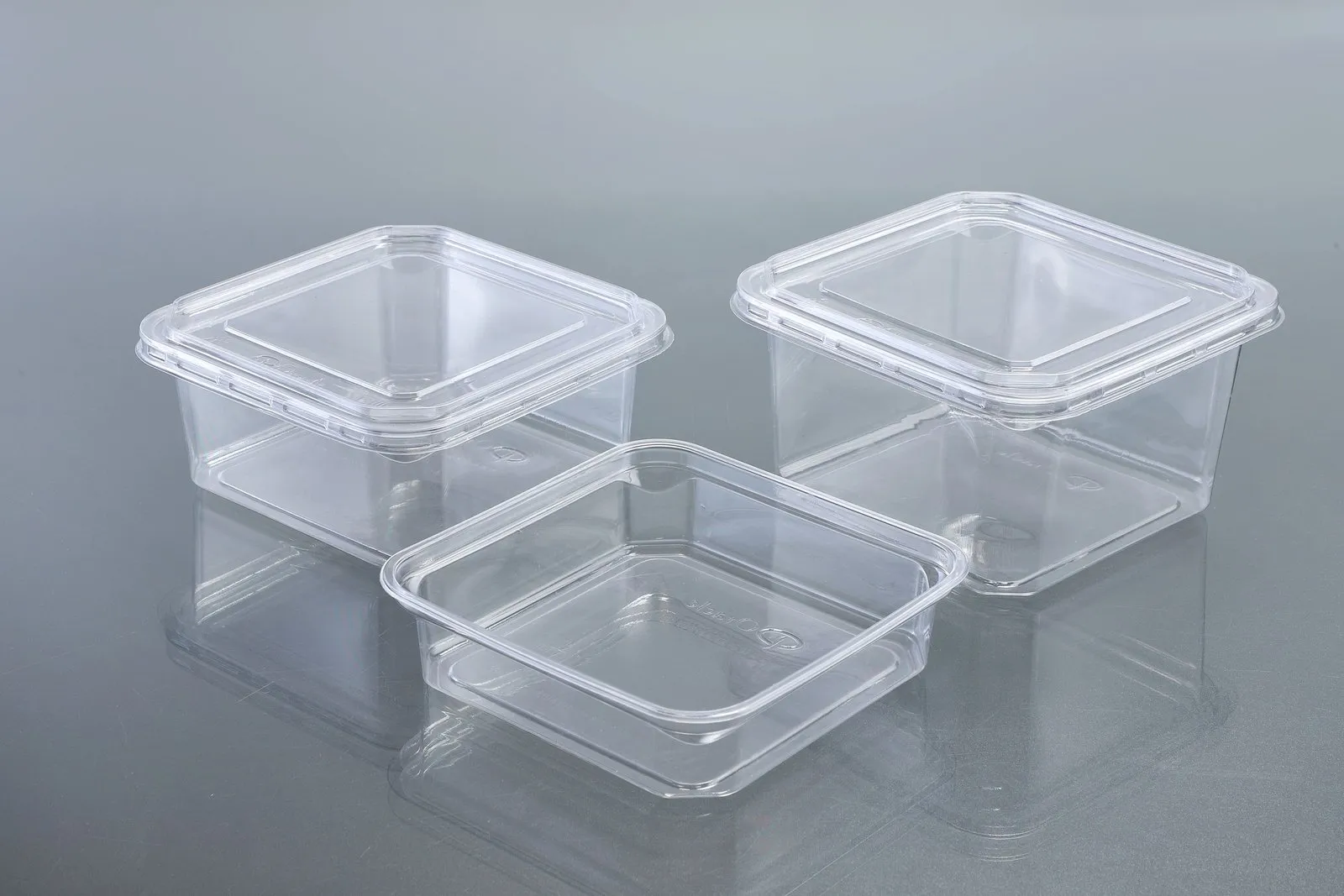 Clear Oracle PET containers with lids in assorted sizes