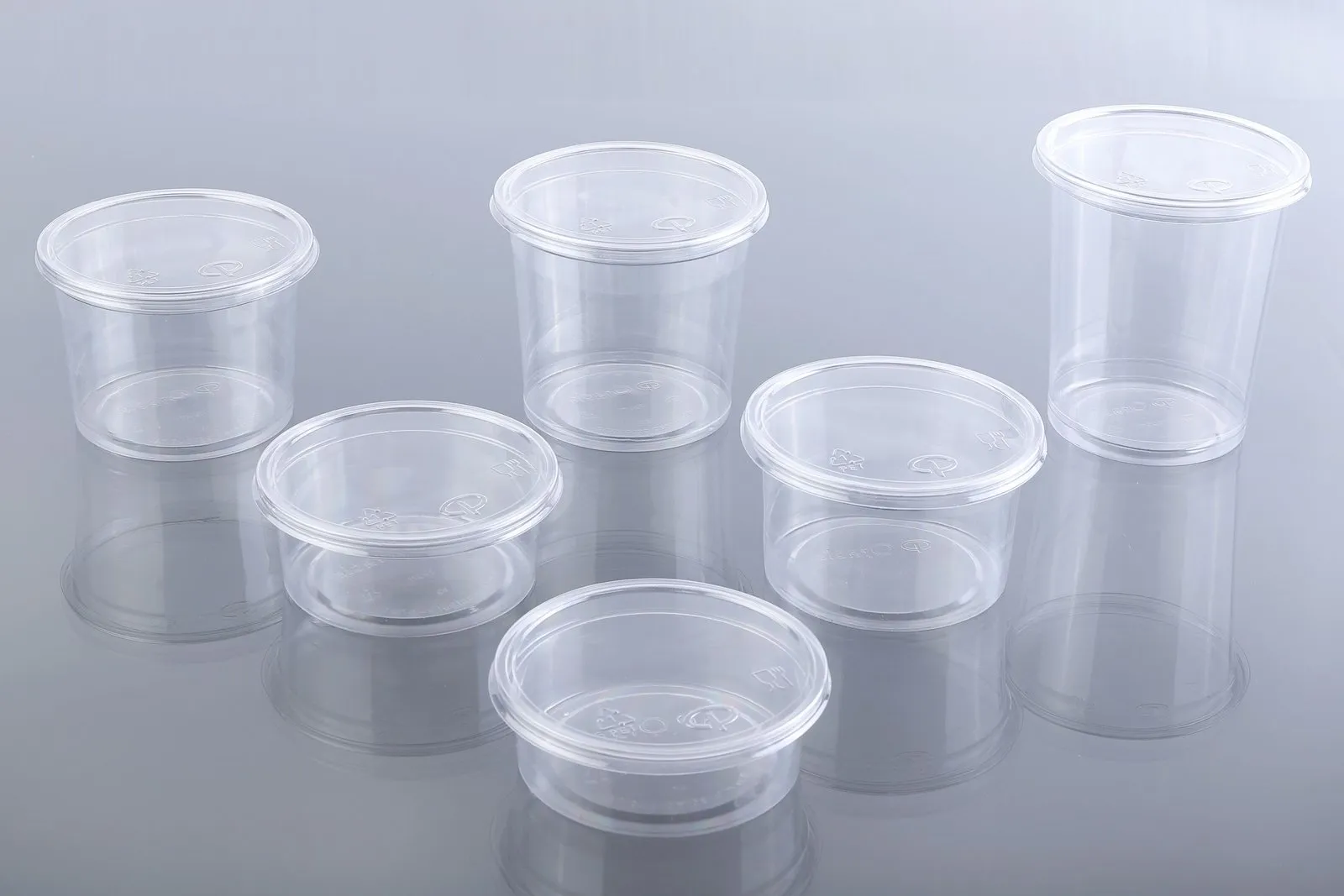 Clear Oracle PET containers with lids in assorted sizes