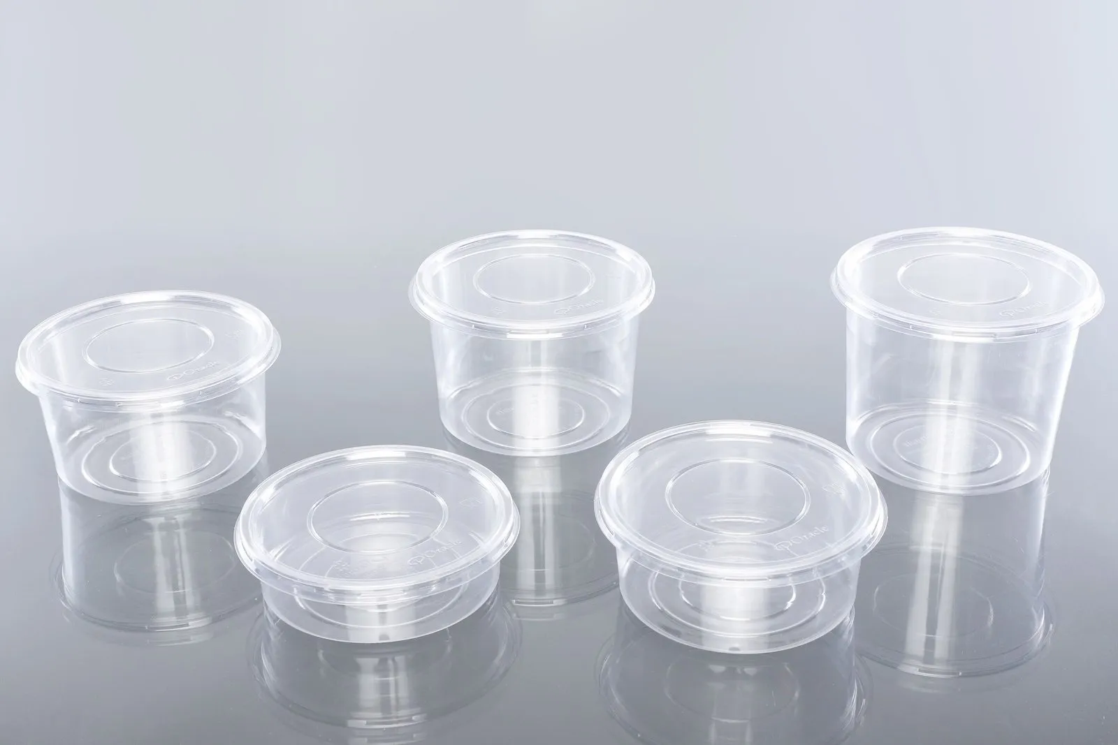 Clear Oracle PET containers with lids in assorted sizes